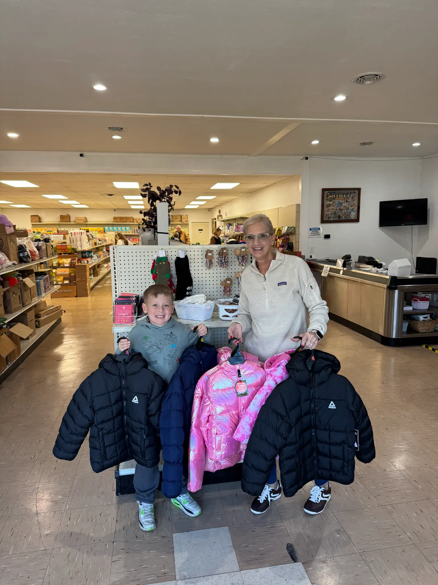 Becky and her nephew collecting coats for coat drive